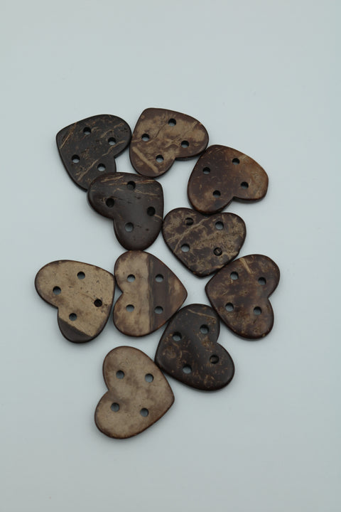 Genuine heart-shaped coconut beads 25x20 mm.