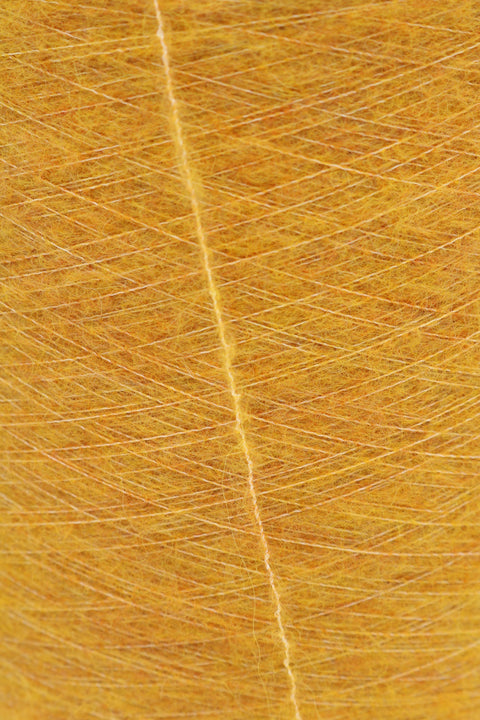 Sonja fylgiþráður 68% Alpakka 30% Polýester 2% Teygja 25 gr. 275 m. Nr. 10