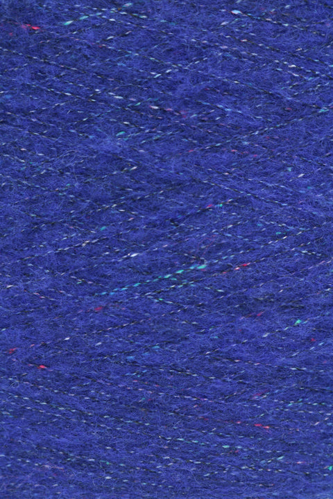 Vertigo tweed fylgiþráður - 25 gr. 51% Extra fine Merino, 31% endurunnið Pólýester og 18% endurunnin Bómull. Kóngablár.