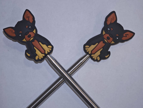 Hlíf á prjónaodda Hundur